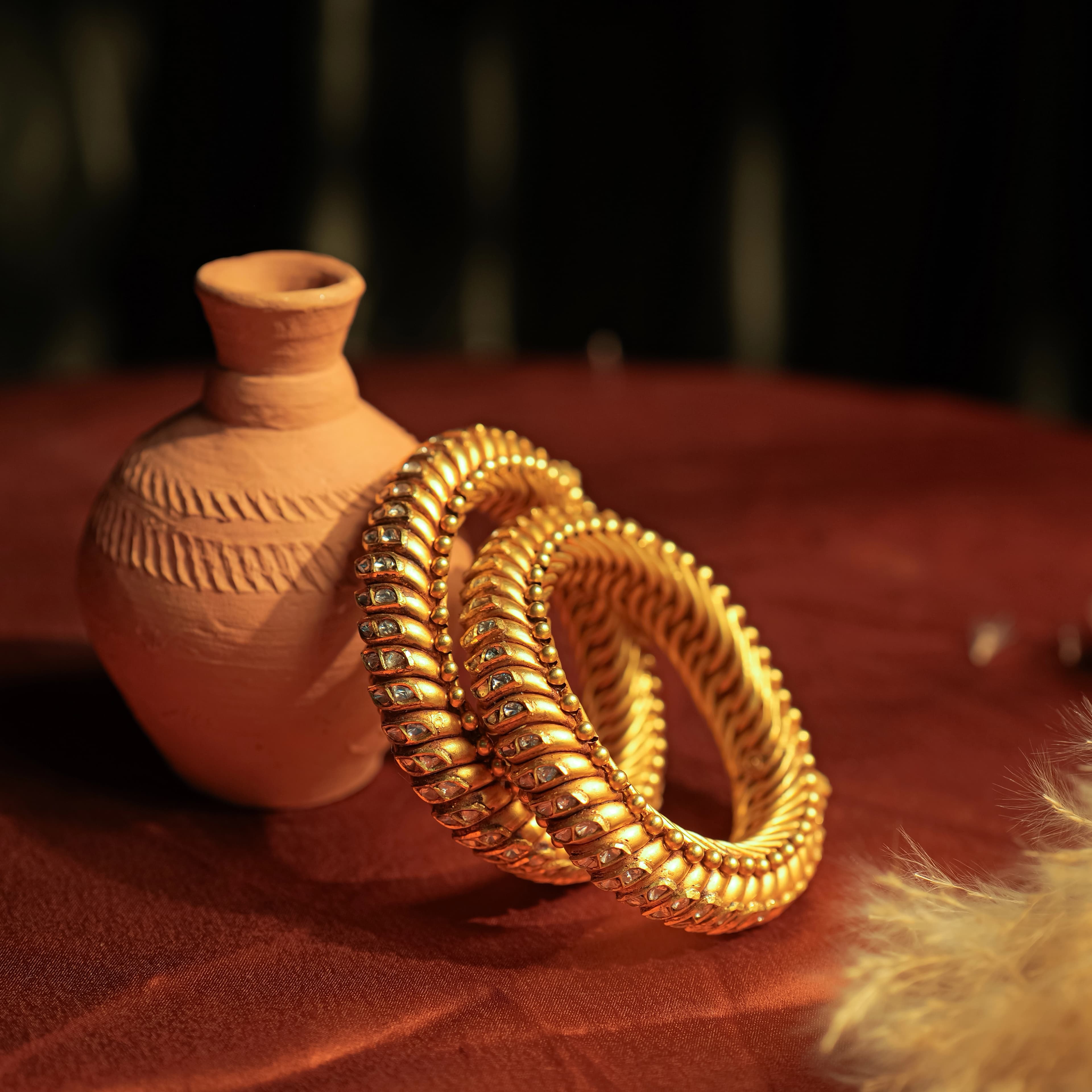 Gold Bangles jewellery at Solitaire Jewellery Boutique
